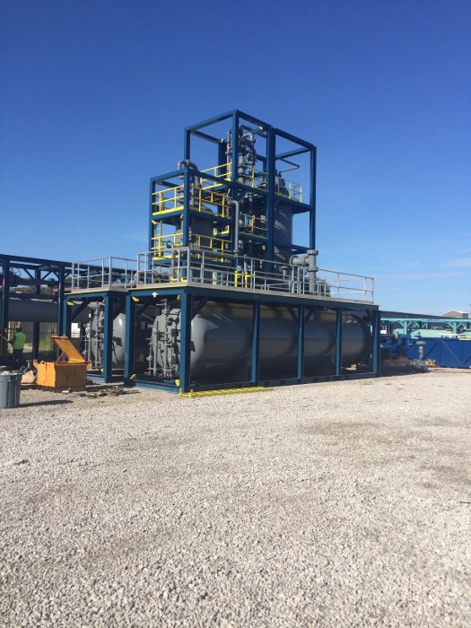 Industrial skid equipment sitting on a finished limestone pad